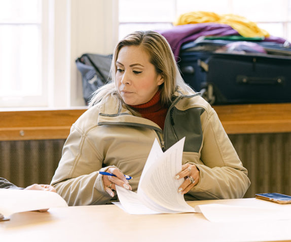 Person sitting at a desk.